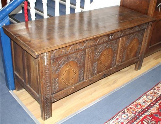 A late 17th century carved oak coffer W.152cm